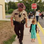 MN Officer Escorts Girl to First Day of Kindergarten