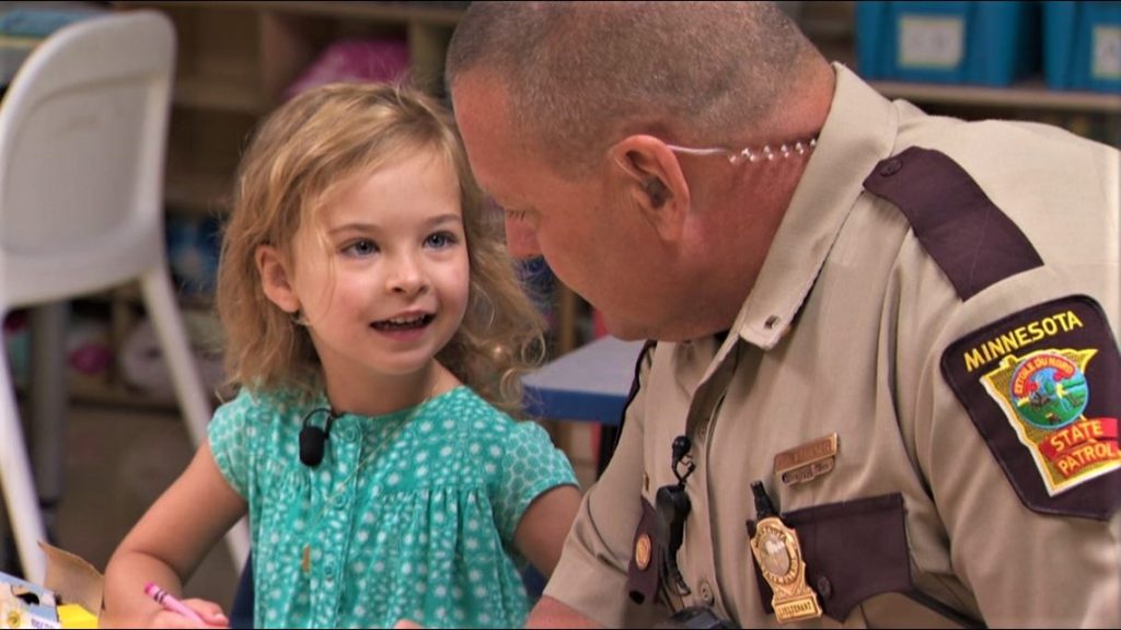 State trooper escorts kindergartener whose life he helped save